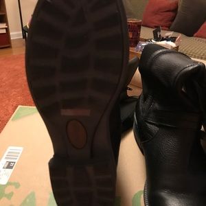 Black leather boots.